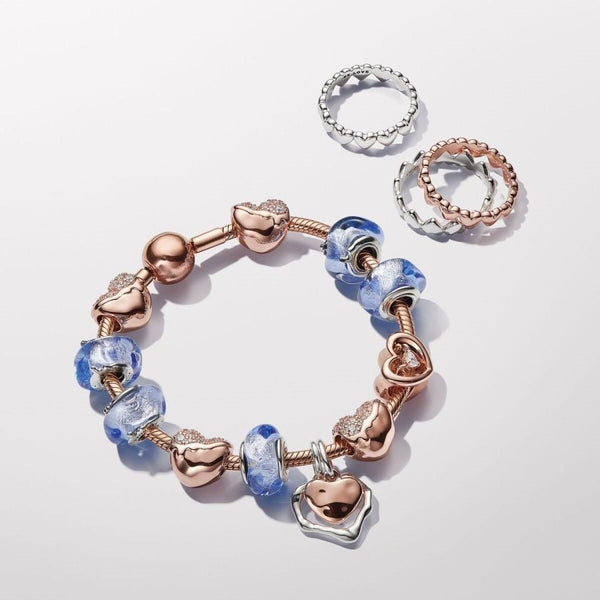 Ring Reihe von Herzen Rosévergoldet